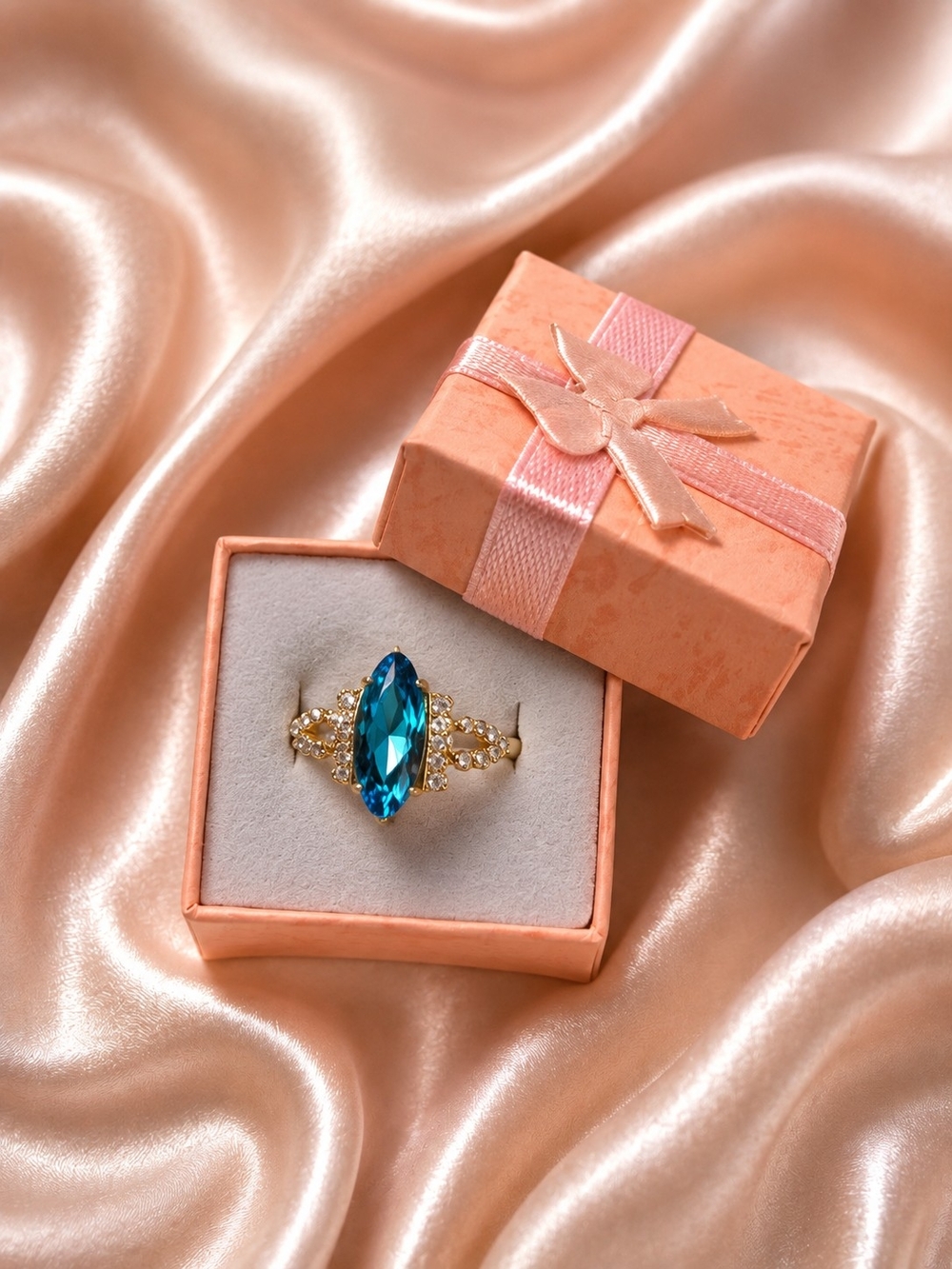 Gold Ring with Blue Marquise Crystal